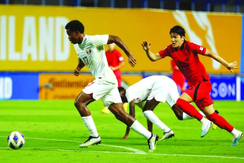 Qatar players in action against South Korea during their first preliminary stage match of the AFC U17 Asian Cup being played in Thailand. Qatar face Iran on Monday.
