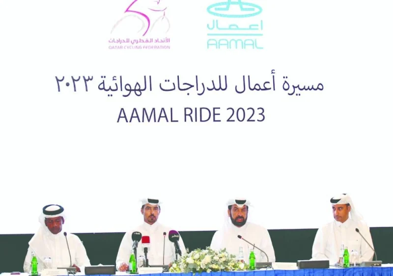 Rashid bin Ali Mansouri, CEO of Aamal Company QPSC, (second right) and Dr Mohamed bin Jaham al-Kuwari, president of Qatar Cycling and Triathlon Federation (QCTF), during a press conference in Doha on Monday. Secretary-General of QCTF, Thani al-Zaraa, is at left.