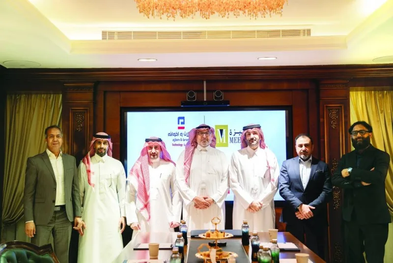 Officials of Meeza and Ajlan Tech during the announcement of their strategic partnership to expand IT services in Saudi Arabia.