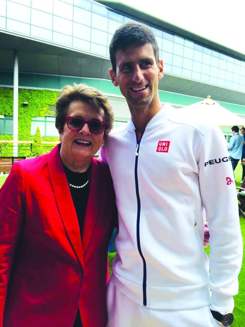 
Billie Jean King is seen with Novak Djokovic. 