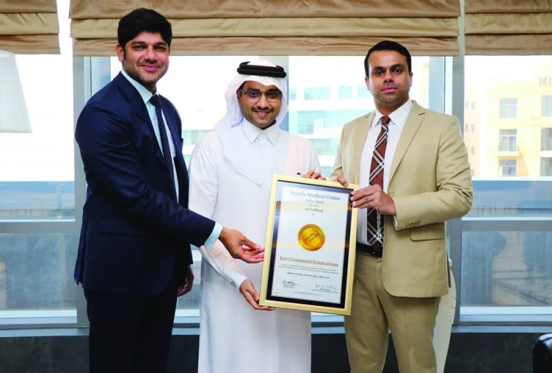 Sheikh Jassim bin Mohamed bin Hamad al-Thani, Jamsheer Hamza and Dr Abdul Kalam hold the JCI certificate.