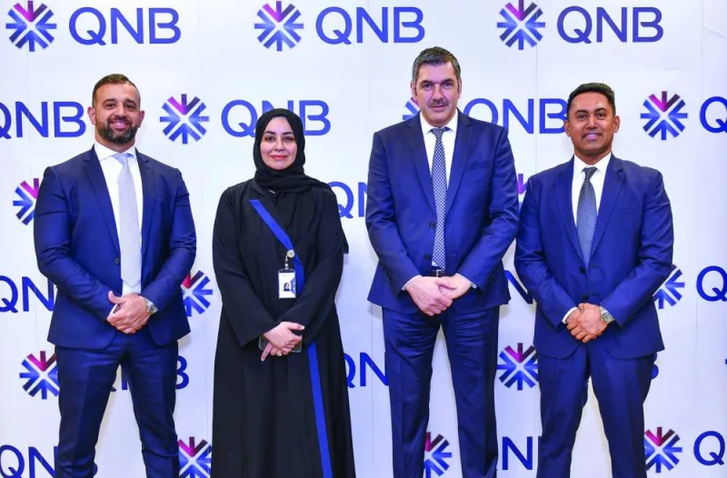 From left: Wissam Shmait, Maryam Mohamed al-Kuwari, Khalid Nobani, Binu M R on the occasion of QNB Group selecting IBM to transform their digital banking experience.