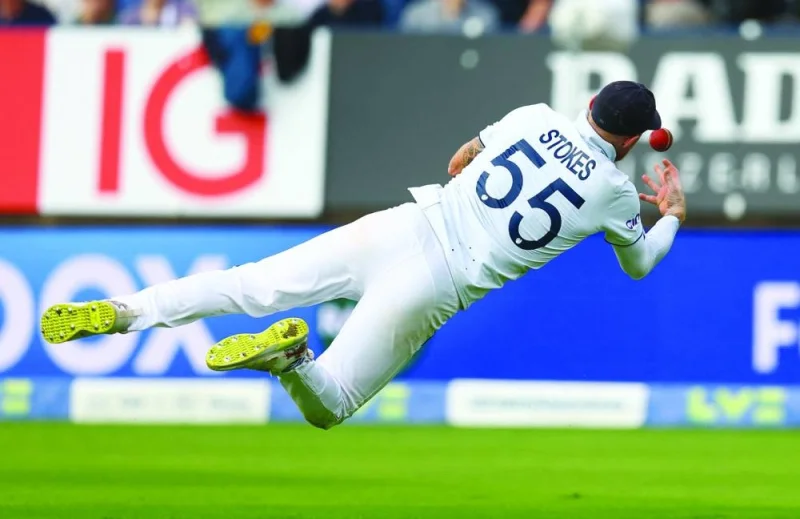 
England’s Ben Stokes drops a catch from Australia’s Nathan Lyon off the bowling of Stuart Broad on Tuesday. (Reuters) 