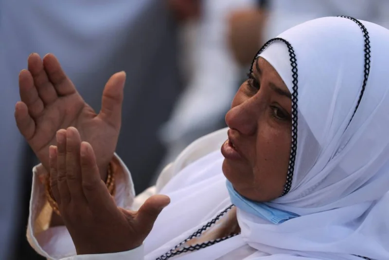 A Muslim pilgrim prays on the Mount of Mercy at the plain of Arafat during the annual haj pilgrimage, outside the holy city of Makkah, Saudi Arabia, June 27, 2023. REUTERS/Mohamed Abd El Ghany
