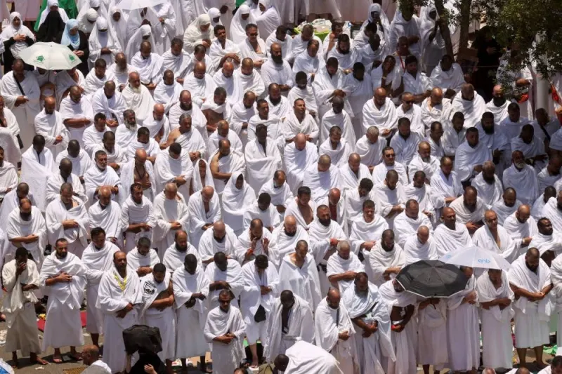 Muslim pilgrims attend the annual Haj pilgrimage outside Namira Mosque on the plain of Arafat, outside the holy city of Makkah, Saudi Arabia, yesterday.