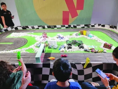 Children enjoying the remote-controlled car race at The Galleria. PICTURE: Joey Aguilar