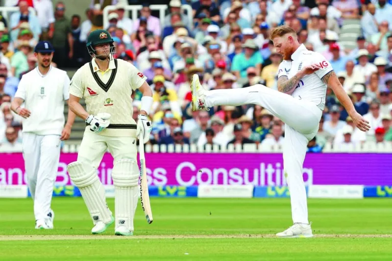 England’s Josh Tongue (left) and Australia’s Steven Smith (centre) look on as England’s captain Ben Stokes reacts after bowling on day one of the second Ashes Test at Lord’s cricket ground in London on Wednesday. (AFP)
