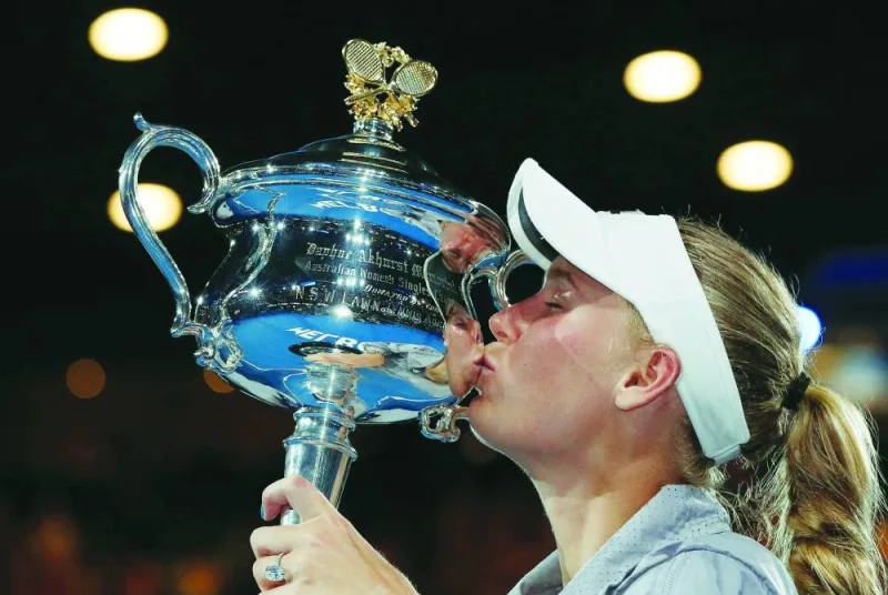 Caroline Wozniacki of Denmark kisses the trophy after winning the Australian Open singles final at Rod Laver Arena, Melbourne, Australia, on January 27, 2018. (Reuters)