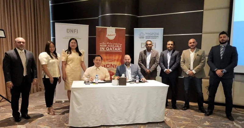 Mekeni Food Corporation president and CEO Prudencio "Pruds" Garcia and Alwatania International Holdings CEO Hassan Alkhiyami sign a commercial agreement for the processing, distribution, and marketing of Mekeni meat products in Qatar.