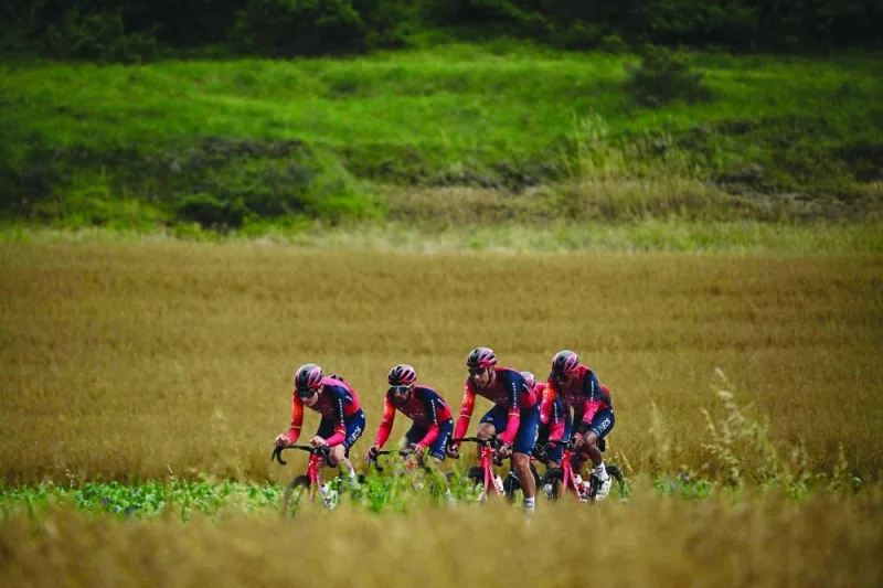
Ineos Grenadiers team riders take part in a training session in Bilbao, northern Spain, on the eve of the start of the 110th edition of the Tour de France cycling race. (AFP) 