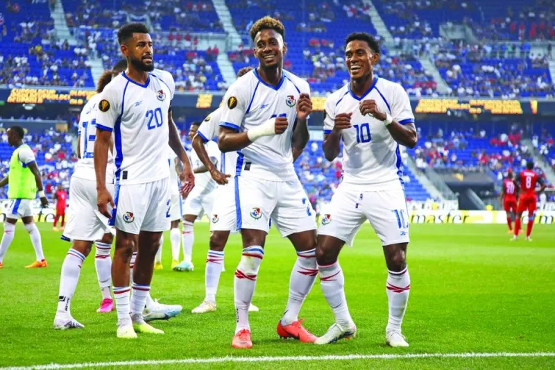 
Panama’s defender Michael Murillo (centre) celebrates with teammates Anibal Godoy (left) and Edgar Barcenas (right) after scoring his team’s second goal during the Concacaf 2023 Gold Cup Group ‘C’ match against Martinique at the Red Bull Arena, in Harrison, New Jersey. (AFP) 