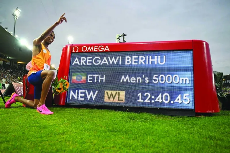 
Ethiopia’s Berihu Aregawi poses after winning and breaking the meet record in the men’s 5,000m event during the IAAF Diamond League “Athletissima” athletics meeting at the Stade Olympique de la Pontaise in Lausanne. (AFP) 