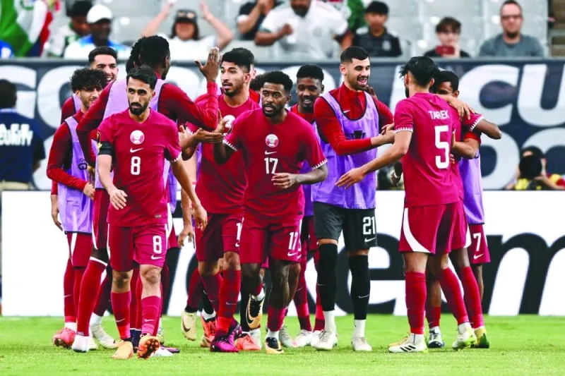 
Qatar’s forward Tameem Alabdulla (centre) celebrates with teammates after scoring a goal during the Concacaf 2023 Gold Cup Group ‘B’ match against Honduras at the State Farm stadium, in Glendale, Arizona, on Thursday. (AFP) 