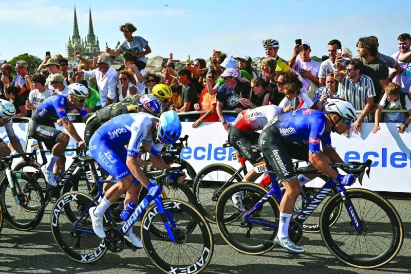 Alpecin-Deceuninck’s Belgian rider Jasper Philipsen (right) sprints ahead of Cofidis’ German rider Simon Geschke (second right) and Team Jayco Alula’s Slovenian rider Luka Mezgec (centre) to the finish line to win the 3rd stage of the 110th edition of the Tour de France cycling race, covering a distance of 193.5km between Amorebieta-Etxano in Northern Spain and Bayonne in southwestern France, on Monday. (AFP)