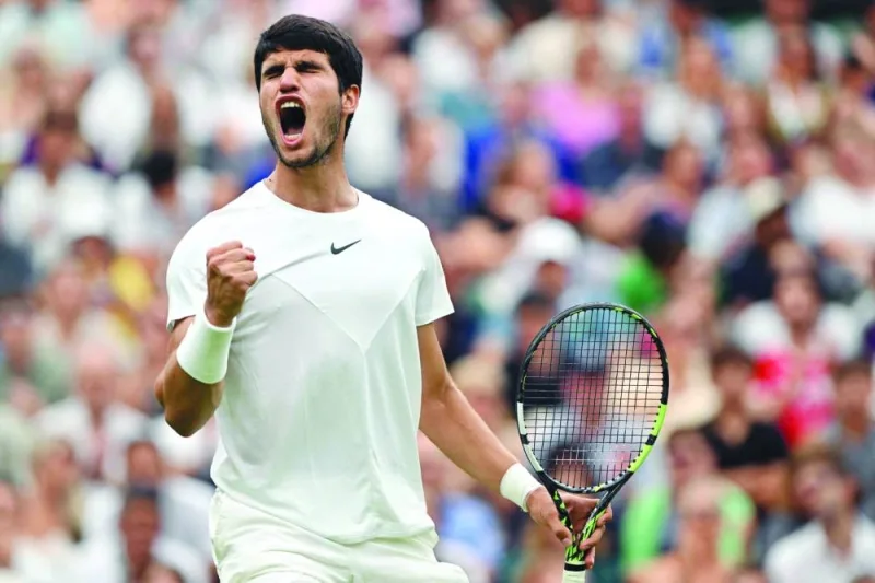 Spain’s Carlos Alcaraz reacts during his match against Chile’s Nicolas Jarry on the sixth day of the Wimbledon Championships at The All England Tennis Club in Wimbledon, London, on Saturday. (AFP)