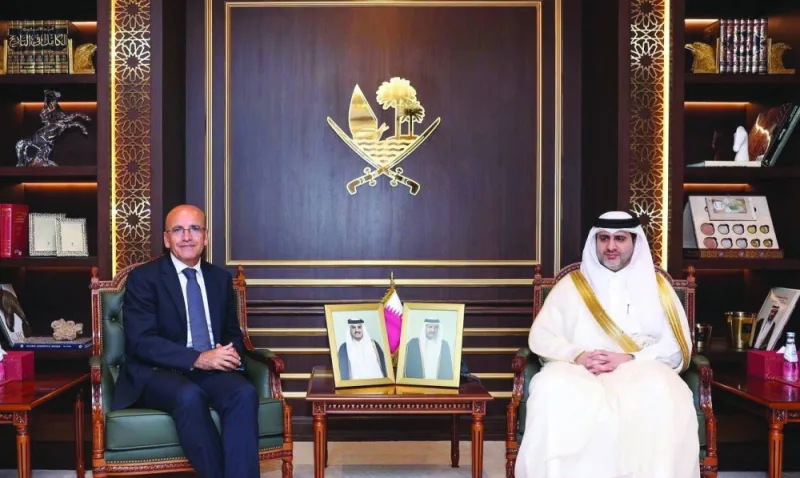 HE the Governor of the Qatar Central Bank Sheikh Bandar bin Mohamed bin Saoud al-Thani meets with Minister of Treasury and Finance of the Republic of Turkiye Mehmet Simsek.