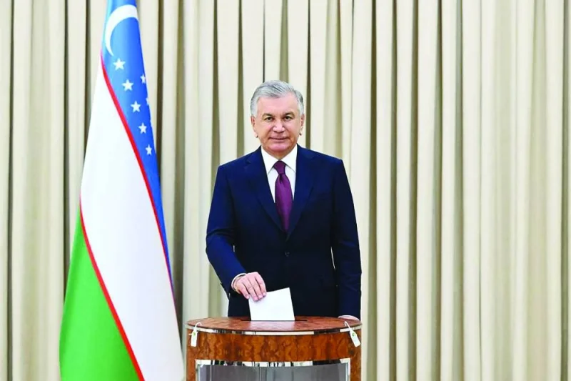 
Uzbekistan President and presidential candidate Shavkat Mirziyoyev votes in the country’s presidential election in Tashkent yesterday. (AFP) 