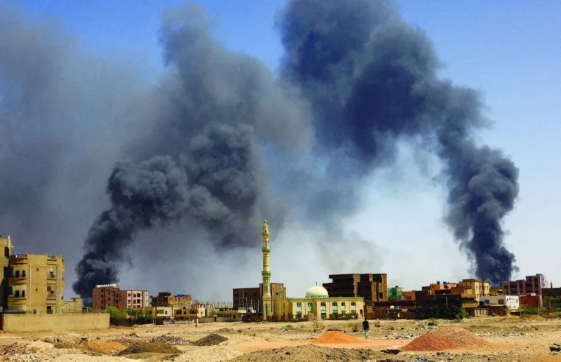 File photo shows smoke rising above buildings after aerial bombardments during clashes between the paramilitary Rapid Support Forces and the army in Khartoum North, Sudan.
