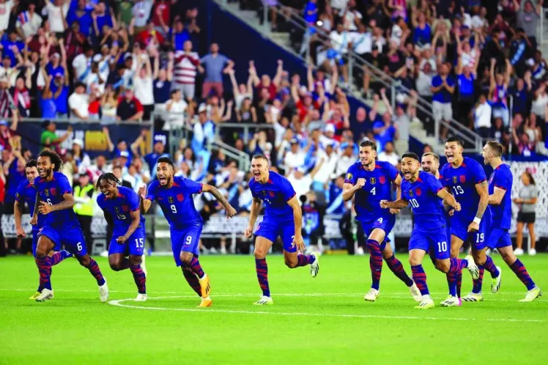 
United States players celebrate after defeating Canada in a penalty shoot out in the Concacaf Gold Cup quarter-final at TQL Stadium in Cincinnati, Ohio. (AFP) 