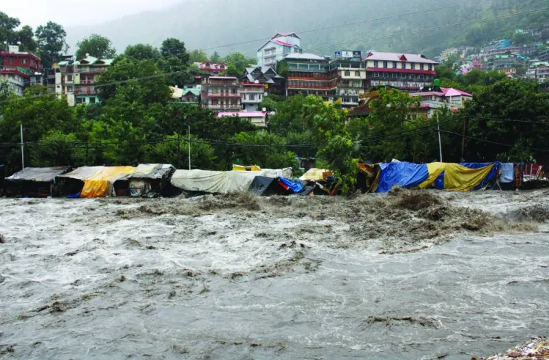 
A view shows the overflowing river Beas following heavy rains in Kullu district in the northern state of Himachal Pradesh, yesterday. 