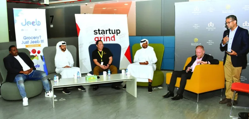 Startup Grind Doha chapter director Indica Amarasinghe (standing) introduces the panel of experts during a discussion on the fintech industry in Qatar. From left are Ahmed Isse, co-founder of Dibsy; Mohamed al-Delaimi, founder and managing director of SkipCash; Michael Javier, CEO and founder of CWallet; Mohamed Suleiman, co-founder of Karty; and Steve Mackie, CEO and founder of Business Start Up Qatar. PICTURE: Thajudheen