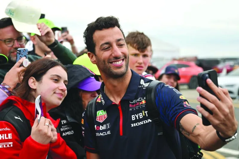 
Red Bull Racing’s Australian reserve driver Daniel Ricciardo arrives for the British Grand Prix at the Silverstone motor racing circuit, central England, on July 9, 2023. (AFP) 