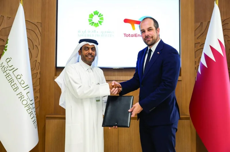 Msheireb Properties CEO Ali al-Kuwari with Total E&P Golfe managing director and Total Country Chair in Qatar Matthieu Bouyer.