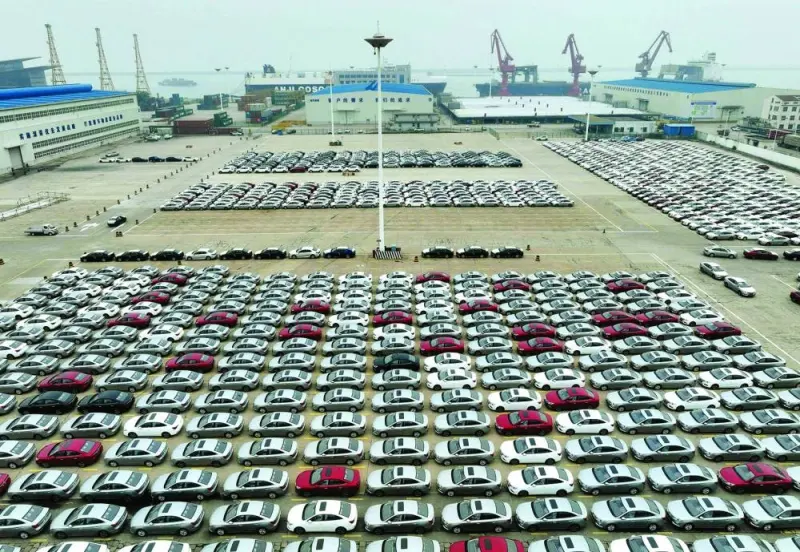 
Cars waiting to be loaded onto a ship at Lianyungang Port, in China’s eastern Jiangsu province. Outbound shipments from the world’s second-largest economy slumped a worse-than-expected 12.4% year-on-year in June, data from China’s Customs Bureau showed yesterday, following a drop of 7.5% in May. 