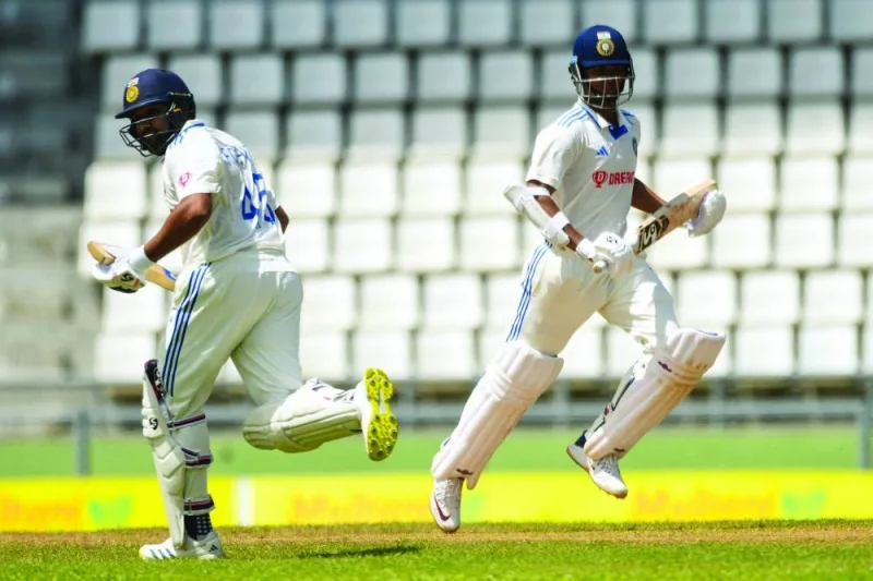 Rohit Sharma (left) and Yashasvi Jaiswal of India in action during day two of the first Test against West Indies at Windsor Park in Roseau, Dominica, on Thursday. (AFP)