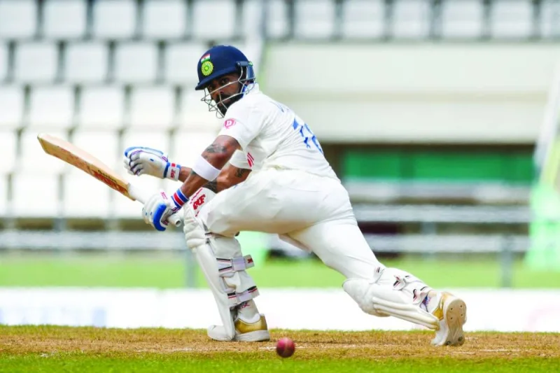 Virat Kohli of India hits a boundary during day three of the first Test against West Indies at Windsor Park in Roseau, Dominica, on Friday. (AFP)