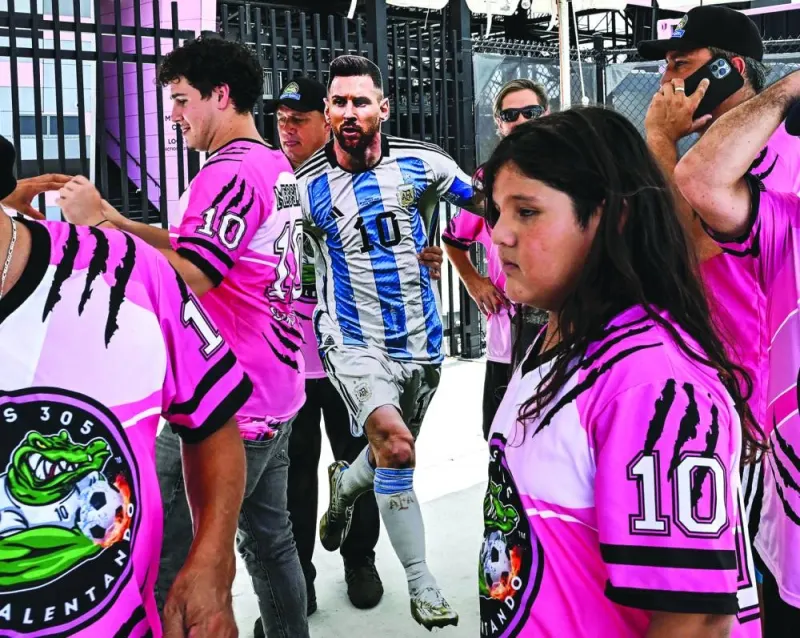 
Fans of Lionel Messi wait for his arrival at the DRV PNK Stadium in Fort Lauderdale, Florida, ahead of his debut in the Major League Soccer with Inter Miami. (AFP) 