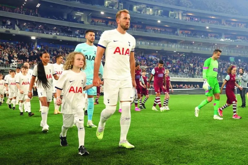 
Tottenham Hotspur’s Harry Kane leads his team out before the friendly match against West Ham in Perth. (Reuters) 