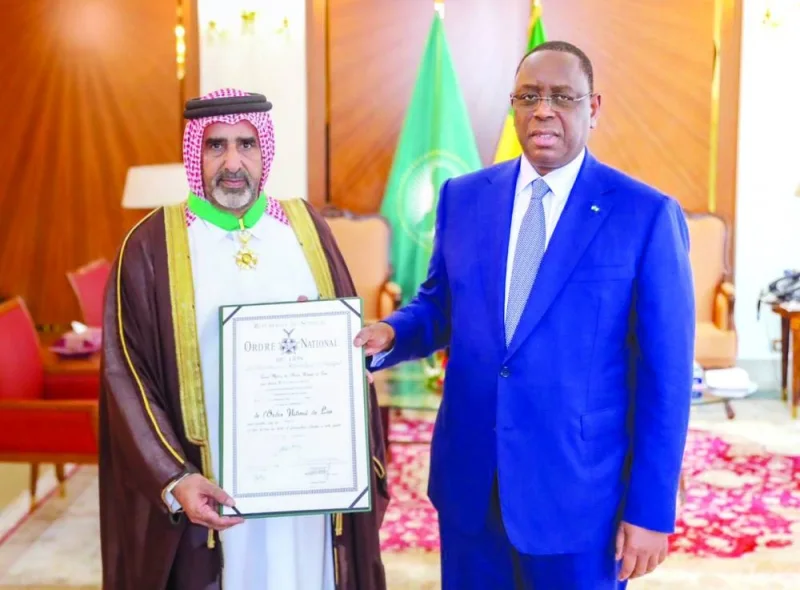 The President of the Republic of Senegal Macky Sall awards HE the Ambassador of the State of Qatar to Senegal Mohammed bin Kurdi Taleb Al Marri the National Order of the Lion.