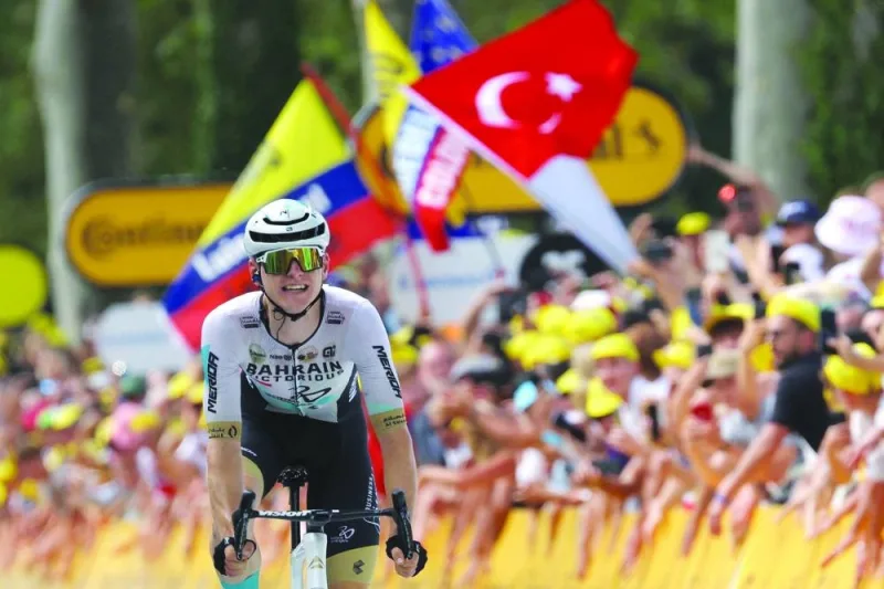 Bahrain Victorious’ Slovenian rider Matej Mohoric cycles to the finish line to win the 19th stage of the 110th edition of the Tour de France cycling race, covering a distance of 173km between Moirans-en-Montagne and Poligny, in the Jura department of central-eastern France, on Friday. (AFP)