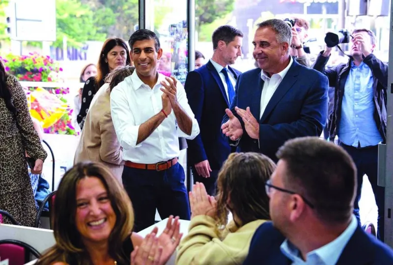 Britain’s Prime Minister Rishi Sunak arrives at a cafe in Ruislip on Friday after a by-election in the northwest London constituency of Uxbridge and south Ruislip.