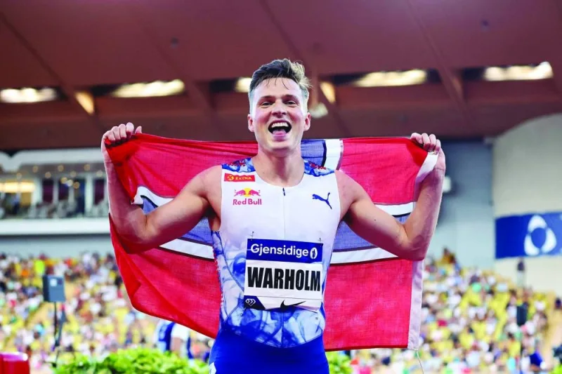 
Karsten Warholm of Norway celebrates winning the men’s 400m hurdles event during the Diamond League meeting in Monaco on Friday. (AFP) 