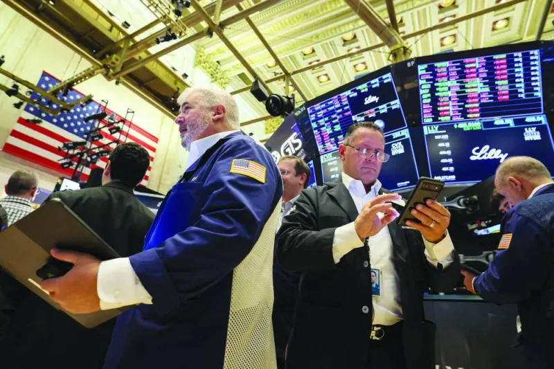 
Traders work on the floor of the New York Stock Exchange. A US stocks rally faces a potential inflection point this week as the Federal Reserve is expected to deliver what may be the final rate hike of its most aggressive monetary policy
tightening cycle in decades. 