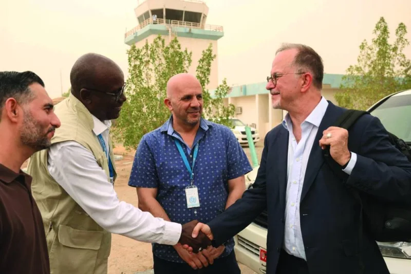 Unicef Deputy Executive Director Ted Chaiban (right) is greeted upon landing at the airport in Port Sudan, on Sunday.