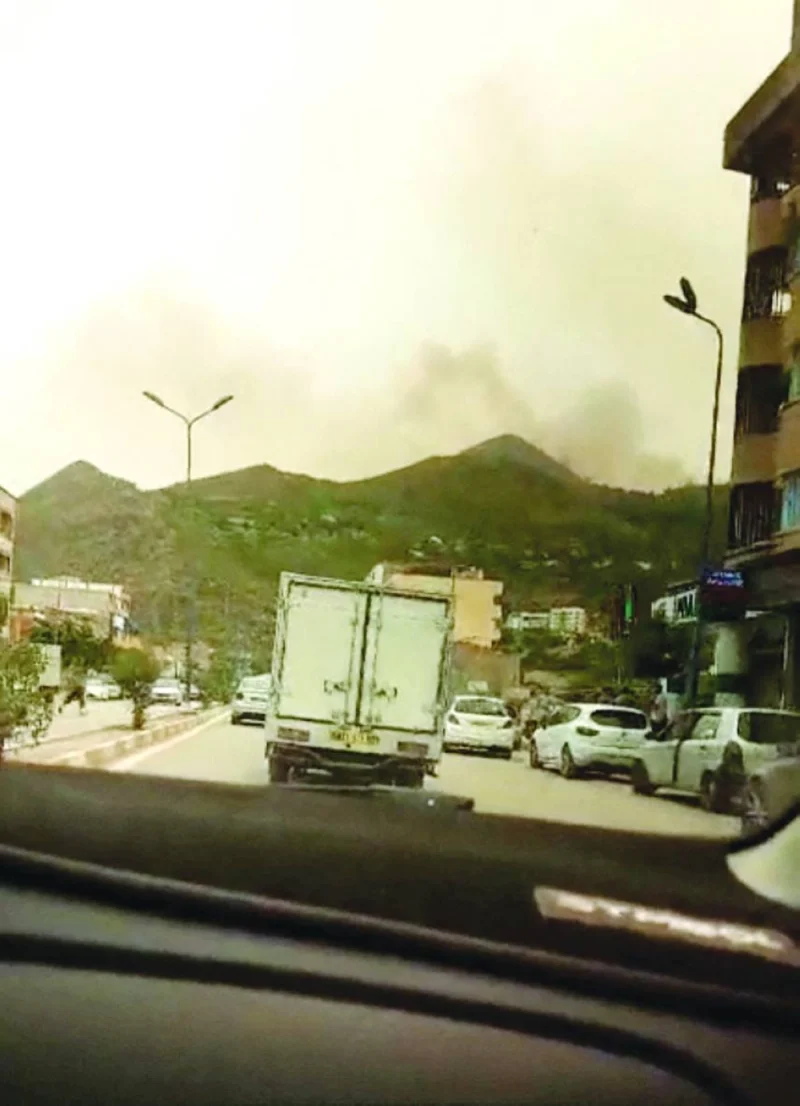Smoke rises following a wildfire in Bejaia, Algeria, on Tuesday in this screengrab obtained from a social media video.