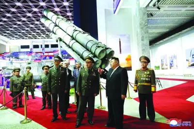 North Korean leader Kim Jong-un visits the weaponry exhibition house with Russian Defence Minister Sergei Shoigu and members of the military delegation in Pyongyang.