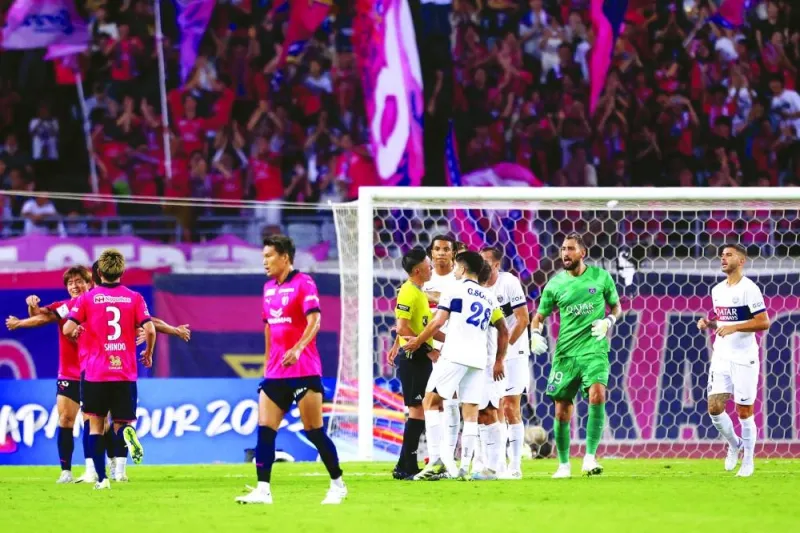 
Paris Saint-Germain’s players remonstrate with the referee as Cerezo Osaka players celebrate a goal scored by Shinji Kagawa during the friendly match at Nagai Stadium in Osaka, Japan. (AFP) 