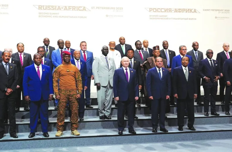 Russian President Vladimir Putin and participants of the Russia-Africa summit pose for a photo in Saint Petersburg, on Friday.