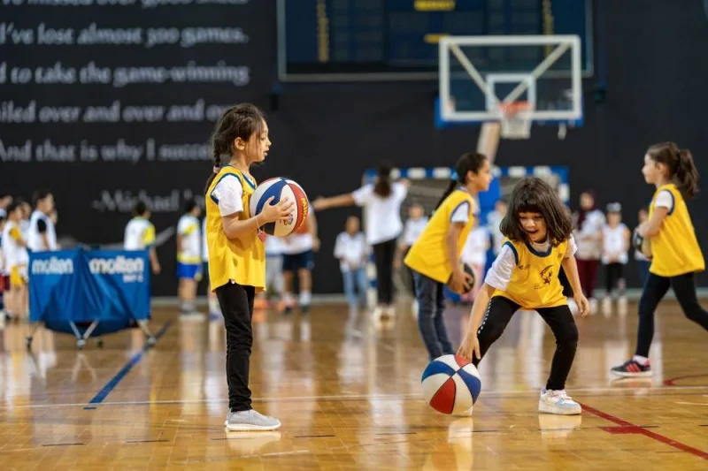 Children taking part in a basket ball match during the camp