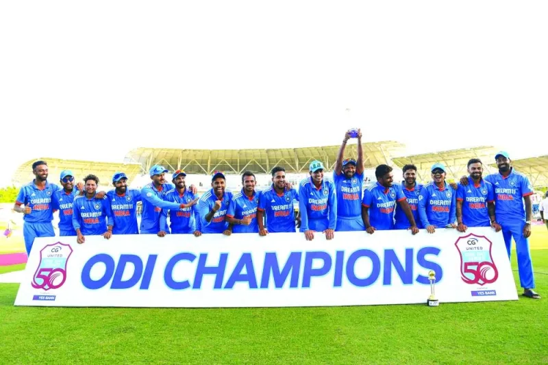 
India players pose after winning the third and final ODI match against hosts West Indies at the Brian Lara Cricket Academy in Tarouba, Trinidad and Tobago, on Tuesday. (AFP) 