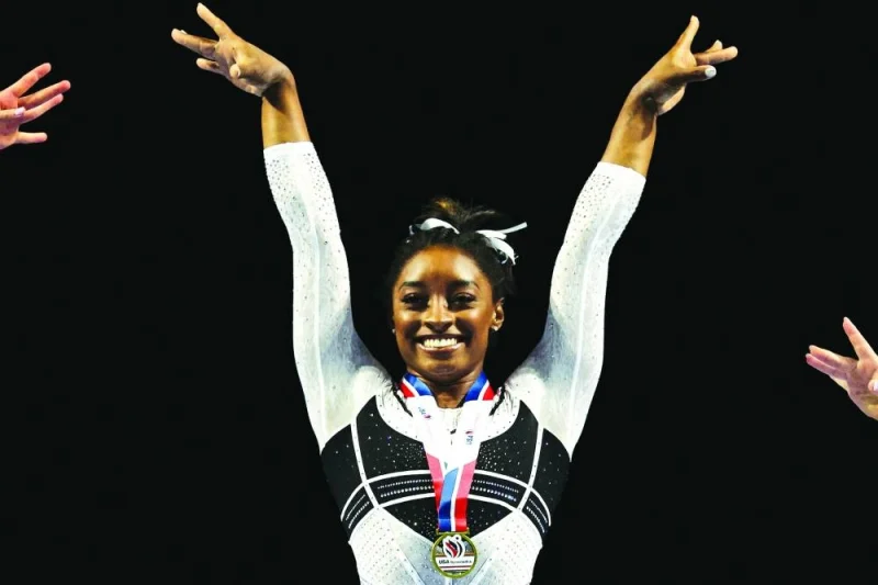 Simone Biles poses during the awards ceremony after winning the all-around of the Core Hydration Classic at NOW Arena in Hoffman Estates, Illinois, US. (USA TODAY Sports)