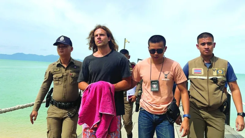 
Daniel Sancho Bronchalo, the son of Spanish actor Rodolfo Sancho Aguirre is escorted while assisting Thai police with investigations after he was arrested on charges of murder in the death and dismemberment of his Colombian travelling companion Edwin Arrieta Arteaga on the tourist island of Koh Phangan, Thailand, yesterday. 