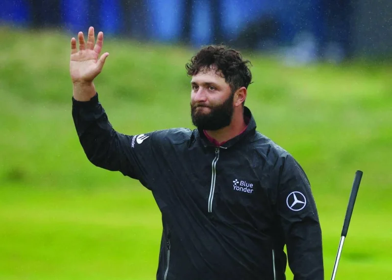 Spain&#039;s Jon Rahm acknowledges the spectators on the 18th green after finishing his final round of the The 151st Open Championship at the Royal Liverpool, Hoylake, Britain, on July 23, 2023. (Reuters) 
