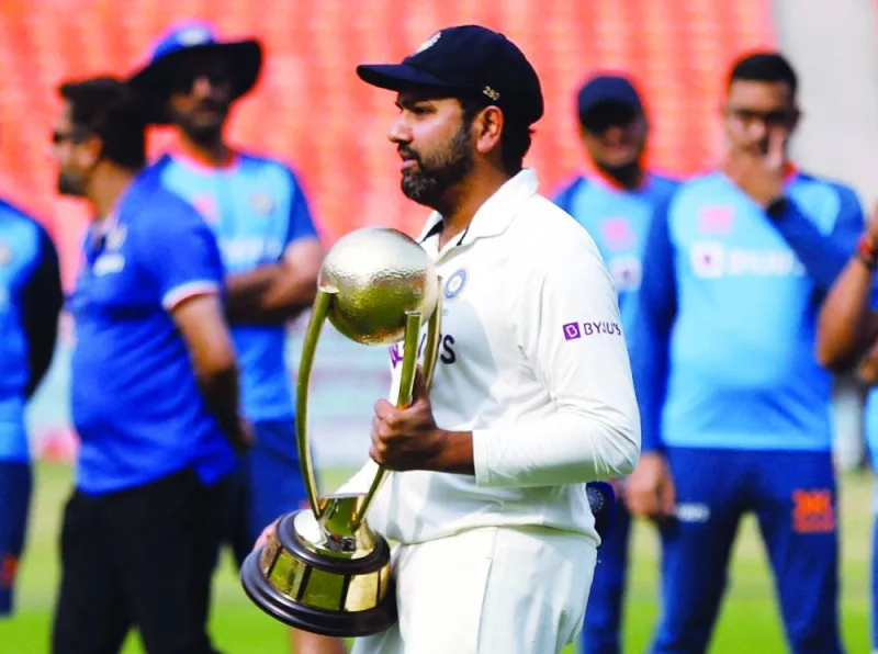 India&#039;s Rohit Sharma receives the Border Gavaskar trophy after winning the test series. FILE PHOTO: Cricket - Fourth Test - India v Australia - Narendra Modi Stadium, Ahmedabad, India - March 13, 2023