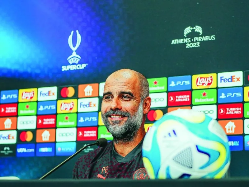 Manchester City coach Pep Guardiola addresses a press conference in Athens on Tuesday. (@ManCity)