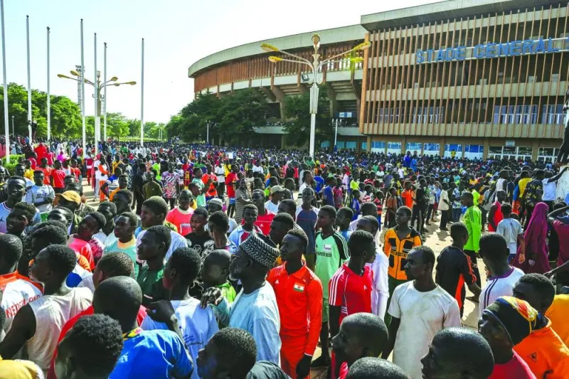 Volunteers gather near General Seyni Kountche Stadium in Niamey on Saturday, responding to the call from several organisations to be registered as civilian auxiliaries to potentially mobilise in support of the armed forces.